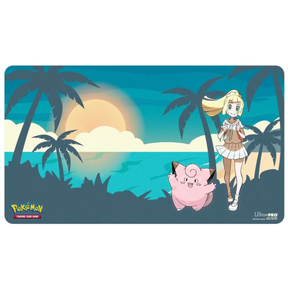 A rectangular Pokémon Ultra Pro playmat featuring a tropical beach scene with palm trees, a large sun, ocean water, a blonde girl character, and a pink creature, shown on a white background. Pokémon Lillie and Clefairy Playmat