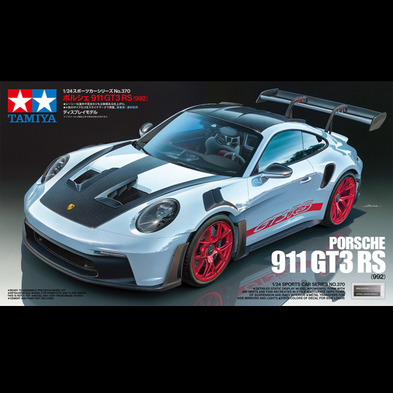 A 1/24 scale plastic model kit of the Porsche 911 GT3 RS (992), showcasing detailed components, authentic decals, and realistic features for model building enthusiasts.