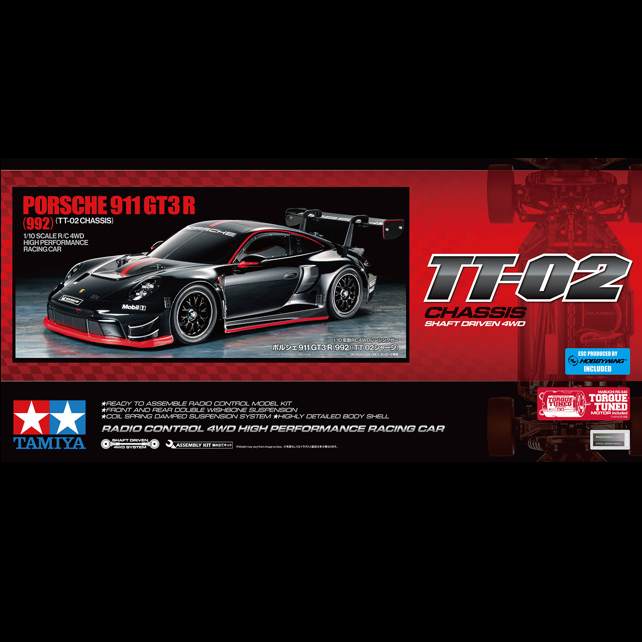 Tamiya Porsche 911 GT3 R (992) TT-02. 1/10 scale R/C model kit with polycarbonate body, TT-02 4WD chassis, slick tyres, decals, and masking tape. Unassembled.