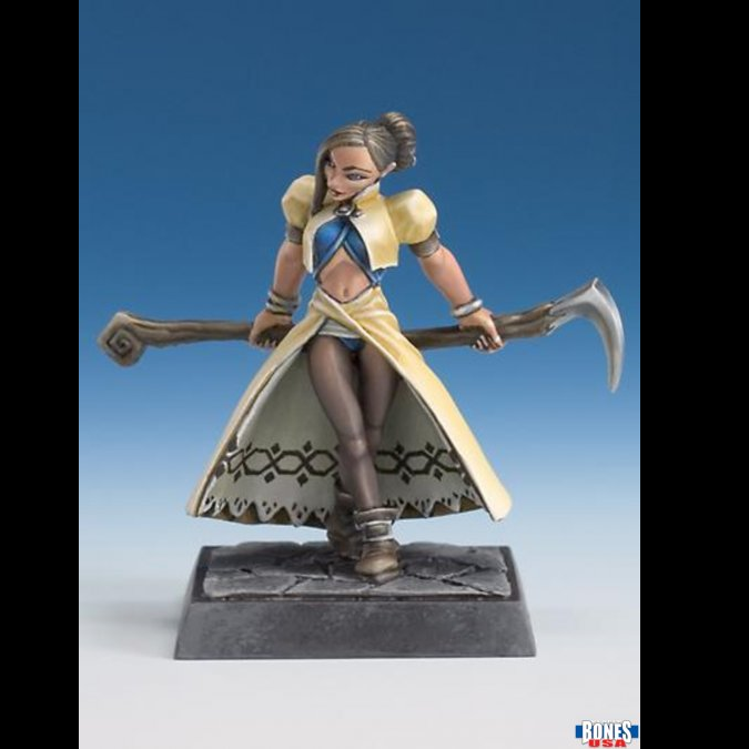 Unpainted Raya, Imperial Sorceress miniature by Werner Klocke from Bones USA Reaper Legends. Holding a staff, with flowing robes and an integral base