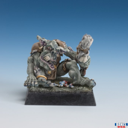 Reaper Miniatures 30235 Orc Shaman. Fantasy miniature figure on a stand with a gradient blue background