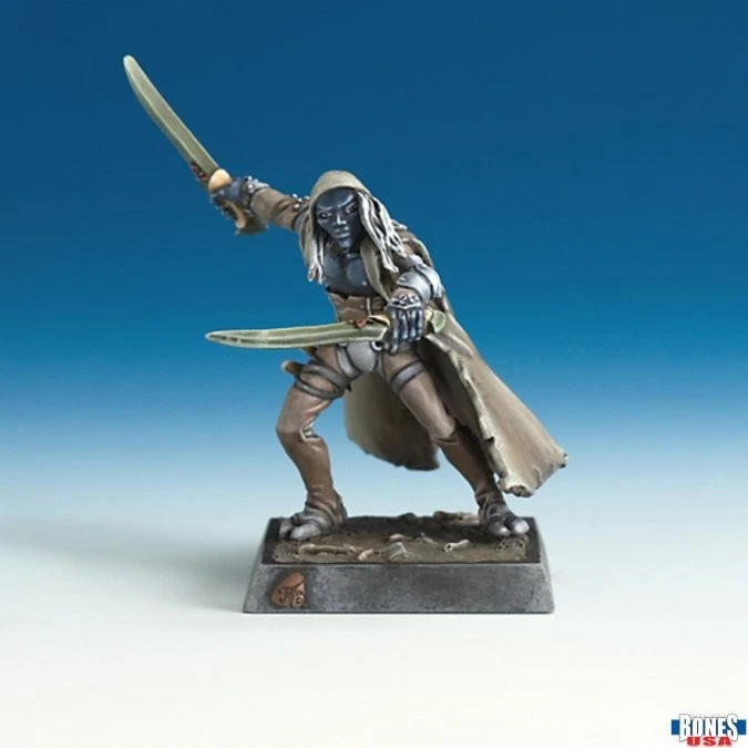 Reaper Miniatures 30244 Tharnyx Shadeborn.Unpainted elf rogue with twin blades, barefoot and wearing a torn long coat; ready to strike in a stealthy, agile pose.