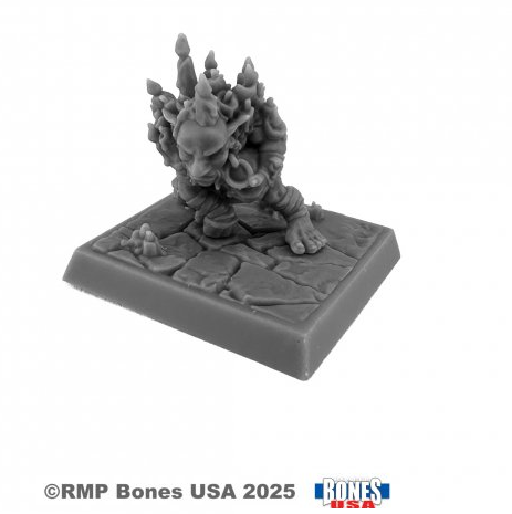 Gray miniature figure on a square base with 'RMP Bones USA' branding. Reaper Miniatures 30269 Vampiric Servant Bones USA Reaper Legends 25mm heroic scale unpainted miniature with candles on back and pointed features