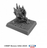 Gray miniature figure on a squar...