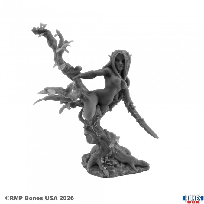 A monochrome gray fantasy figurine of a nude female figure posed on a gnarled tree-like base, photographed against a plain white background. Small copyright and brand marks appear in the corners. Drys, Dryad Female Woodland Spirit