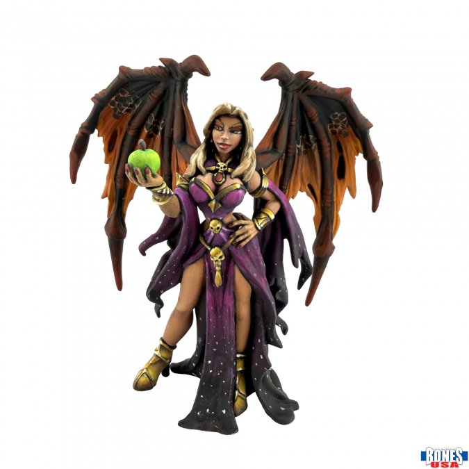 A fantasy winged female figure statue holding a green apple, wearing a purple and black gown with gold accents, set against a plain white background. Headmistress Sophie ReaperCon 2026