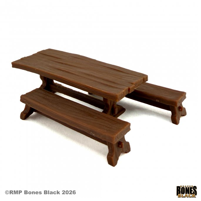 A miniature brown wooden picnic table and bench set, designed as a tabletop gaming prop, shown on a white background with RMP Bones Black branding. Table and Benches