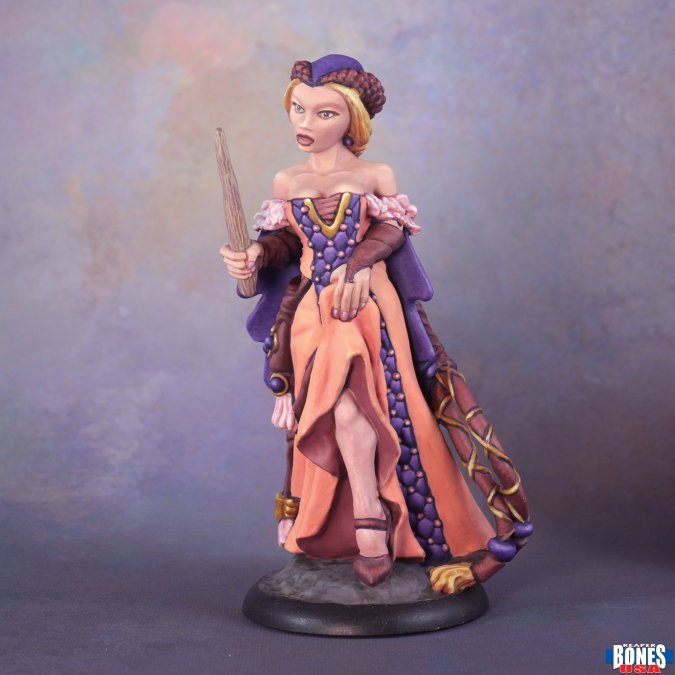 Fantasy figurine of a woman in a detailed dress holding a staff on a gray background