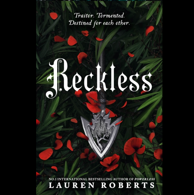 Reckless: Deluxe Collector's Edition by Lauren Roberts, volume two from the Powerless Trilogy. A 400 page hardback novel with fantasy romance and social issue themes.