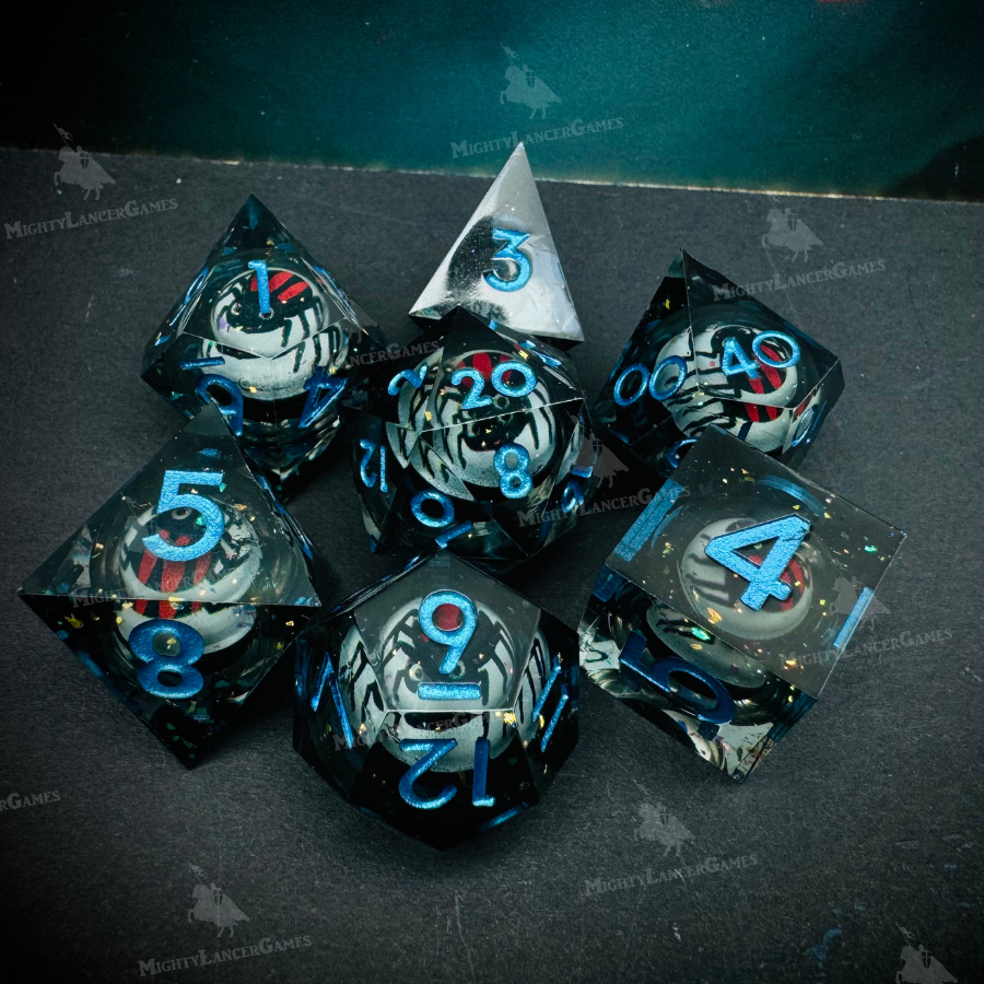 Set of 7 liquid core RPG dice with semi-transparent shells and blue numbers, featuring a suspended red spider inside. Comes in a black case with view window.