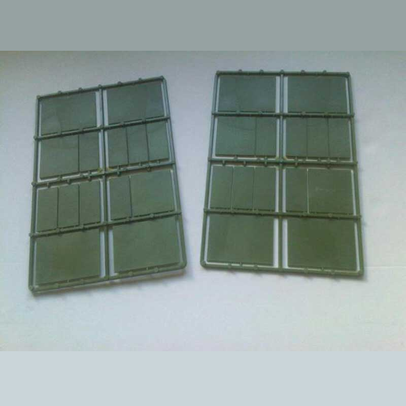 Renedra Cavalry Bases. Two green plastic panels with grid patterns on a white background