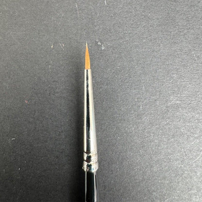 Rosemary & Co Series 363 Kolinsky Sable 2. Small paintbrush with a silver ferrule on a gray background