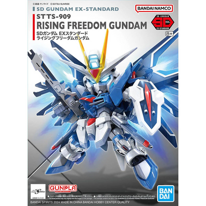 Model kit packaging of Rising Freedom Gundam with Bandai and Gunpla branding. SD Gundam Ex-Standard Rising Freedom Gundam