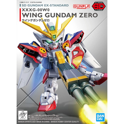 Model kit of Wing Gundam Zero with Bandai logo on a white background. SD Gundam Ex-Standard Wing Gundam Zero