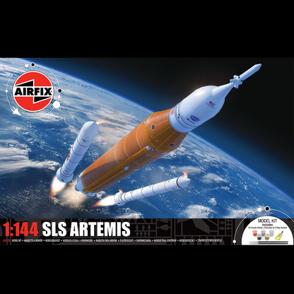 A 1:144 scale SLS Artemis rocket and Orion capsule model with white body and black detailing, shown unassembled on a plain surface.