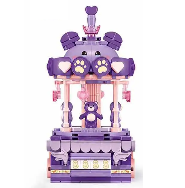 Purple toy structure with teddy bear and paw prints on a white background. Sluban Baby Bear Carousel Brick Kit