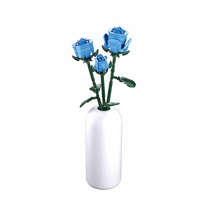 White vase with blue flowers on a white background. Sluban Blue Rose brick kit 