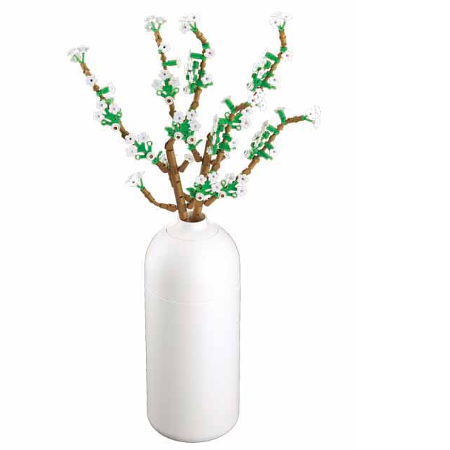 White vase with decorative branches on a white background. Sluban  Fontanesia  brick kit