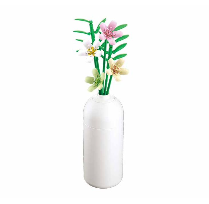 White vase with decorative flowers on a white background. Sluban Freesia brick kit