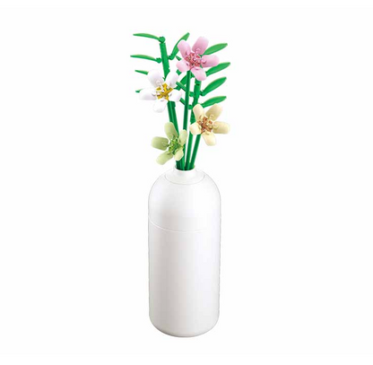 White vase with decorative flowers on a white background. Sluban Freesia brick kit