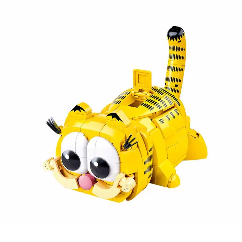 A yellow and black striped cat-shaped toy built from interlocking blocks, shown on a plain white background. Sluban Garfield building block pencil pot with two facial expressions and secret storage compartment