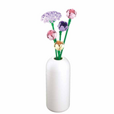White vase with colourful artifi...