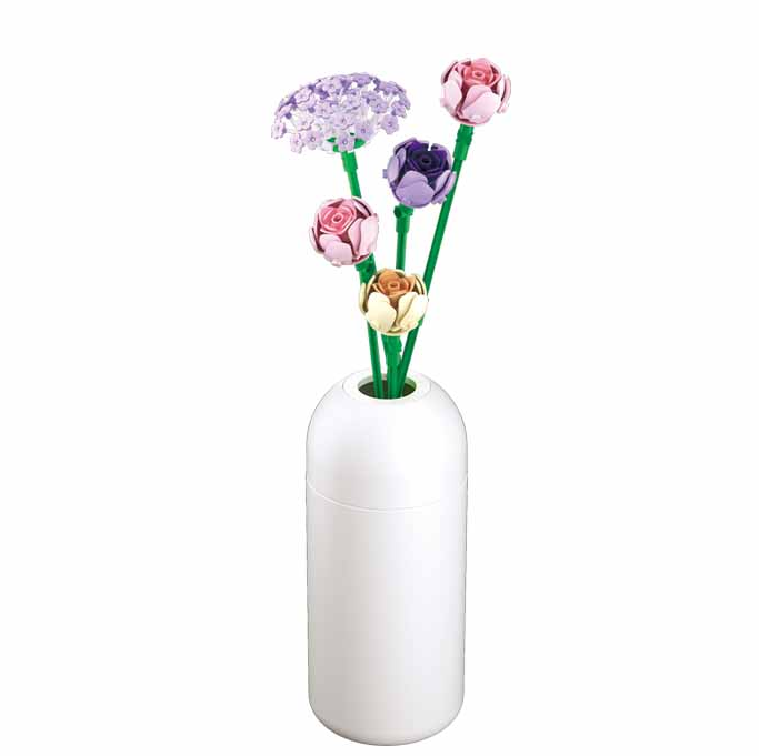 White vase with colourful artificial flowers on a white background. Sluban Peony brick kit