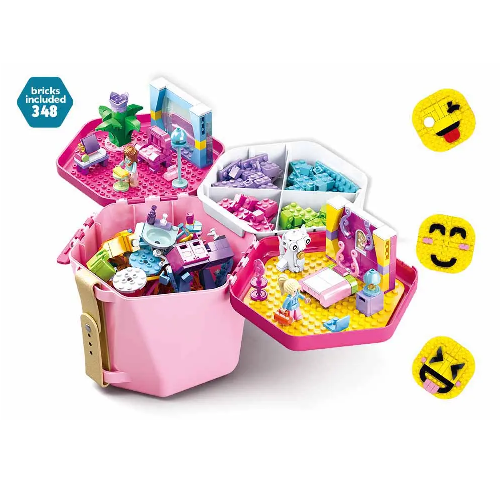 Toy building set with pink organizer and various mini figures and accessories on a white background. Sluban Pink Bricks Bucket  Building Bricks