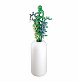White vase with a decorative pla...