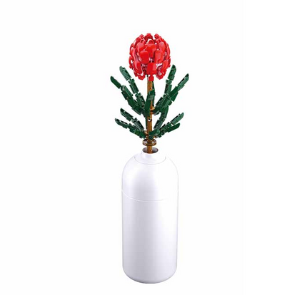 Red flower in a white vase on a white background. Sluban Tibouchina Urvilleana brick kit