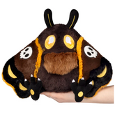 A plush toy shaped like a cute d...
