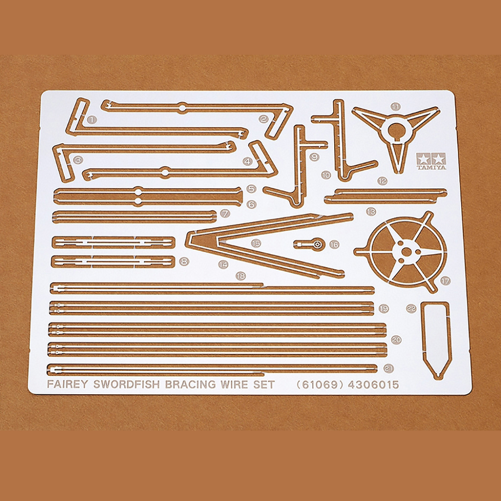 Tamiya Fairey Swordfish Etched Parts. Photo-etched bracing wire set for 1/48 scale biplanes. Adds authentic detail for expert builders. Includes sights for torpedoes.

