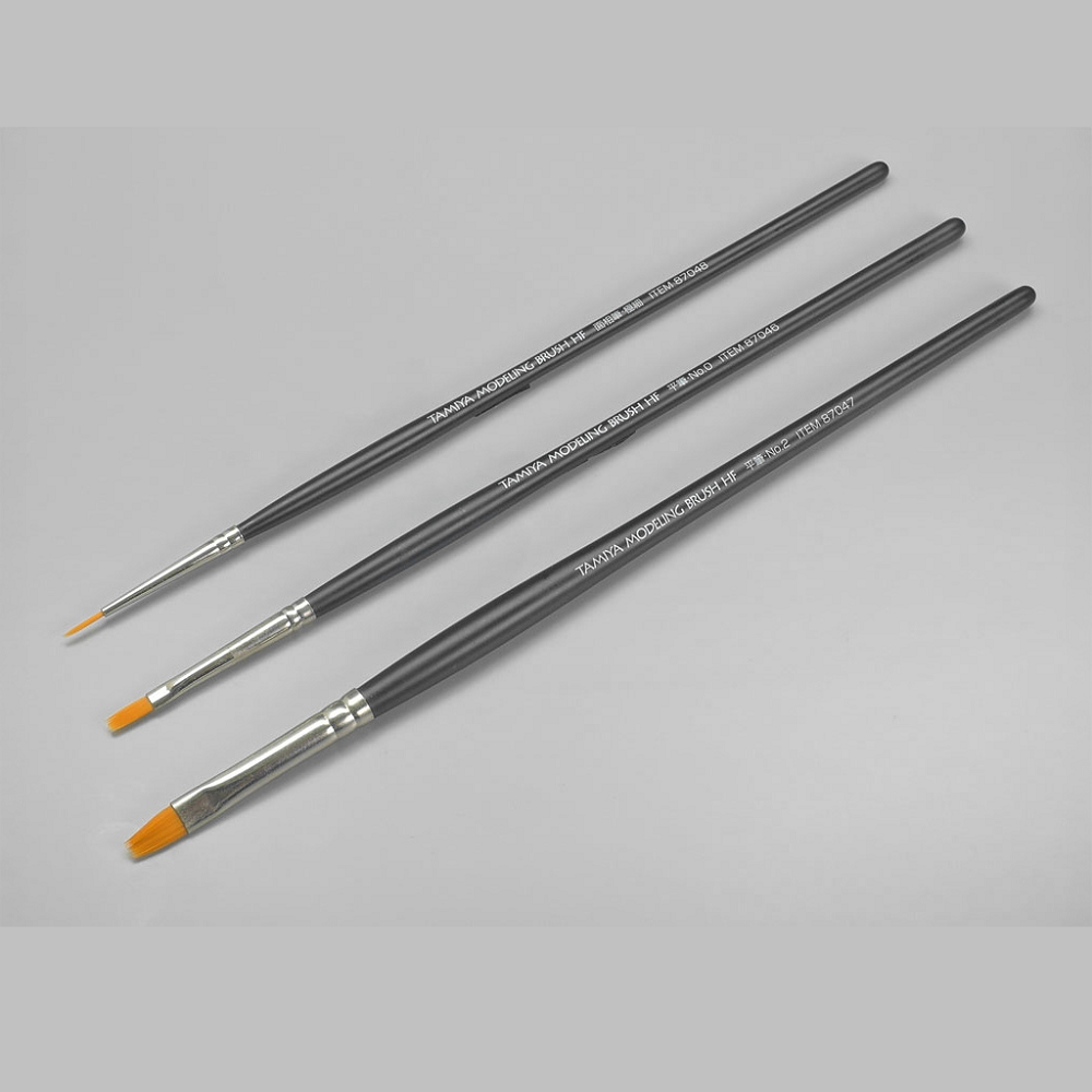 Tamiya Modelling Brush HF Standard Set. A pack of 3 brushes with resin bristles for precise painting. Includes flat brushes and an ultra-fine pointed brush
