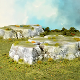 Rocky landscape with grass and s...