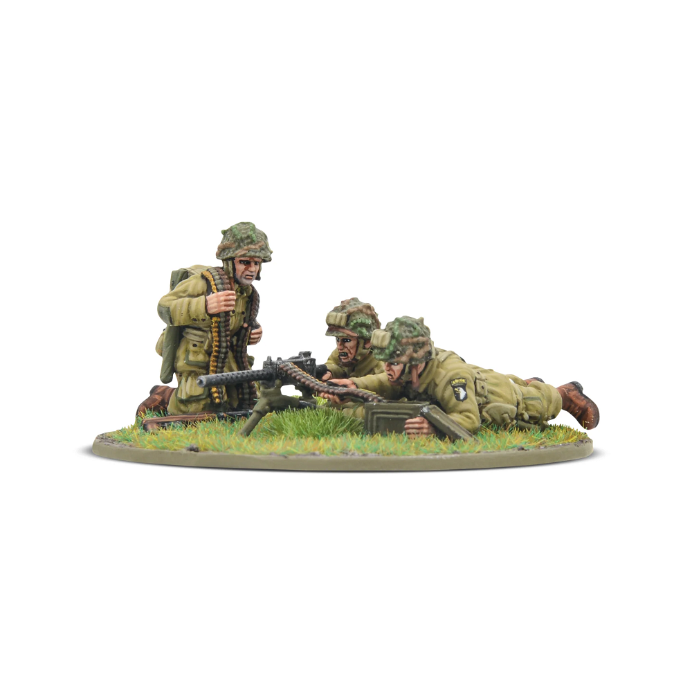 US Airborne (D-Day) MMG Team. Equip your Bolt Action army with a Browning .30cal machine gun and crew in iconic D-Day uniforms. 28mm scale, unpainted.
