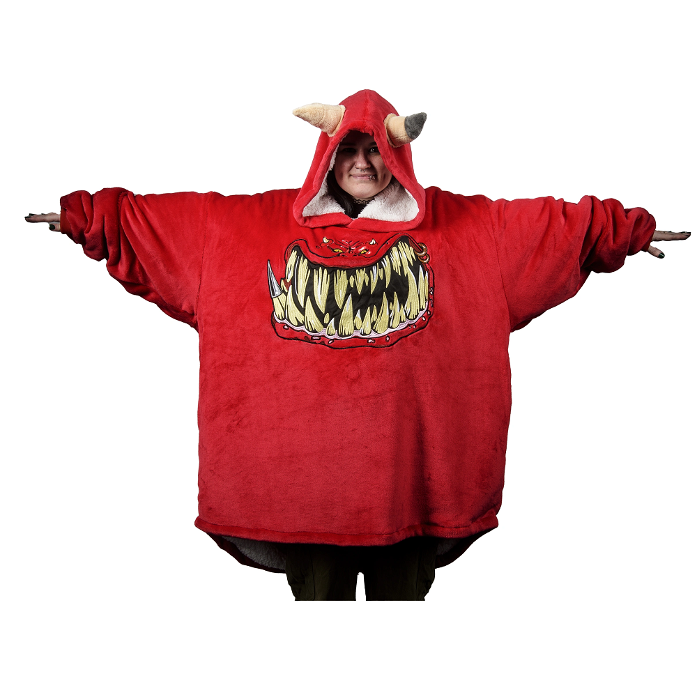 Warhammer 40,000: Red Squig Hooded Blanket. Person wearing a red hoodie with a monster design on a white background