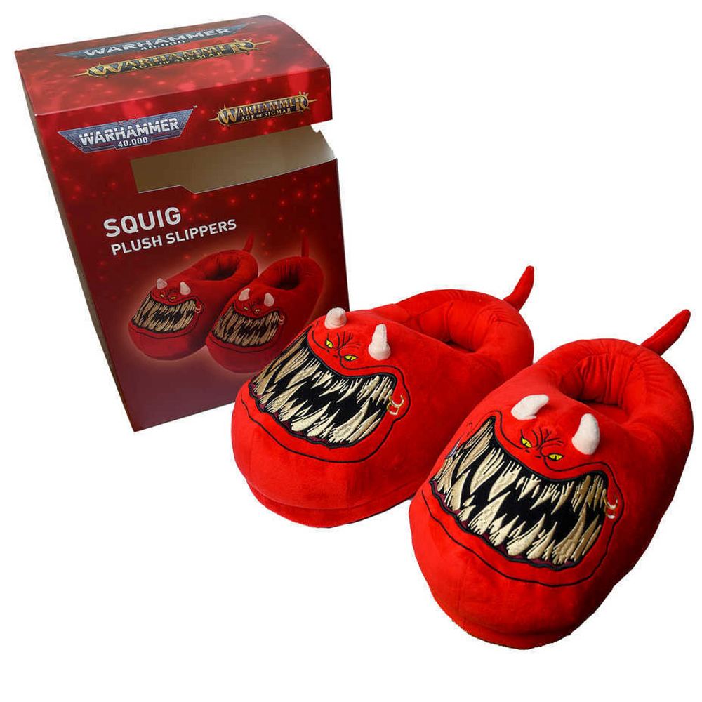 Warhammer 40,000: Red Squig Slippers. Red plush slippers with a design and their packaging featuring 'Warhammer' branding.