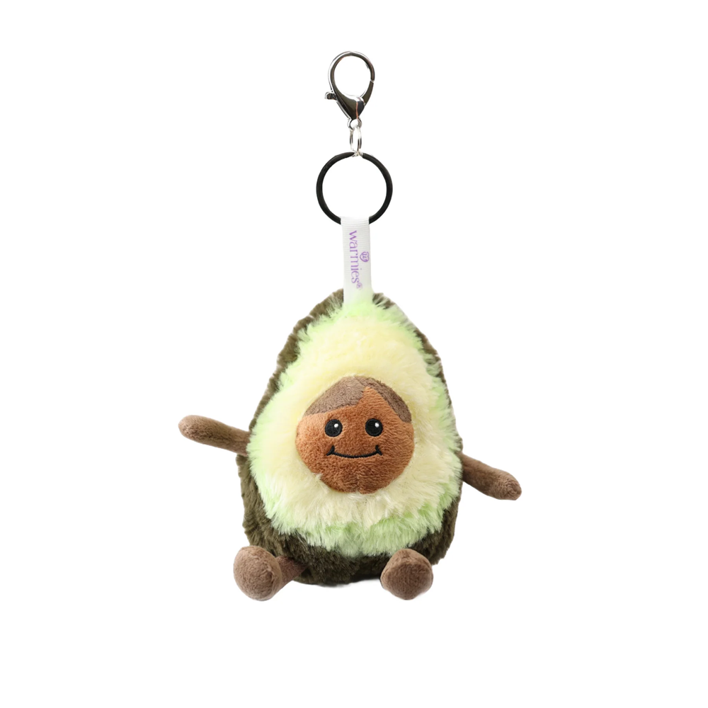 Plush avocado keychain with a smiling face on a white background. Warmies Avocado Bag Charm Plushie