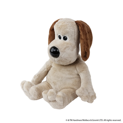 Plush toy dog with brown ears and black nose on a white background. Warmies Plush Gromit Microwavable Plushies