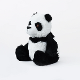 A plush panda toy sitting uprigh...
