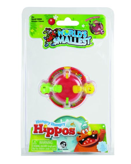 Hungry Hungry Hippos toy set in its original blister packaging, featuring a red circular toy with four yellow hippo faces and green handles, branded with 'Too Small to Matter' and 'Hungry Hungry Hippos'. World's Smallest Hungry Hungry Hippos miniature game