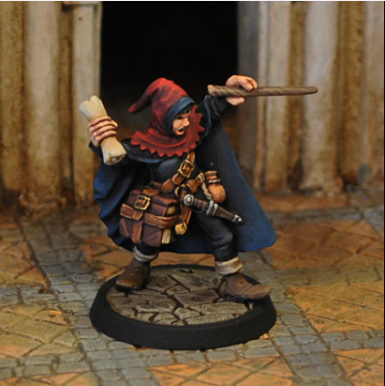 Sorcerer miniature holding wand and scroll with hood, cape, and spellbook on belt. White metal figure for tabletop RPGs, wargames, and painting projects.