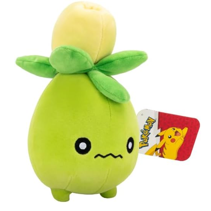 Plush toy resembling a green fruit with a yellow top, attached to a Pokemon tag on a white background.