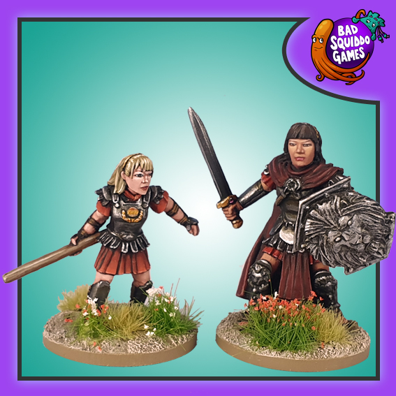 Amazon Heroines by Bad Squiddo Games both are wearing armour, one has a sword and one a shield and the smaller one has a pole