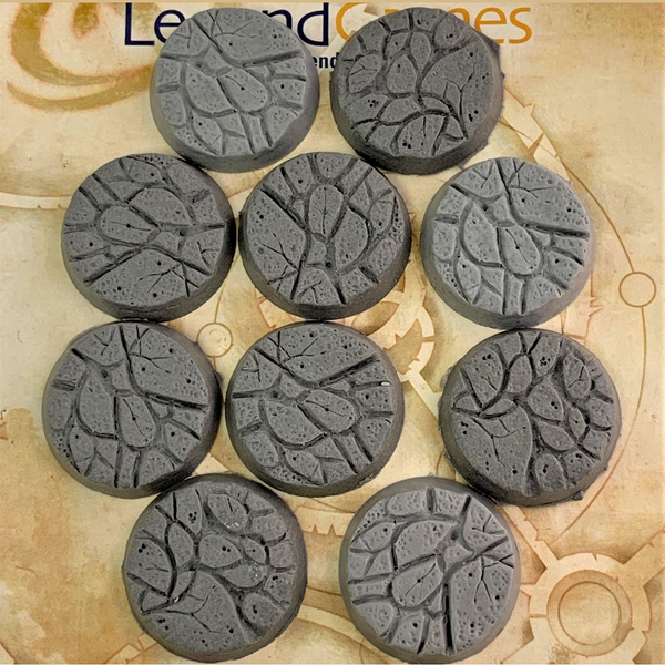 A pack of 32mm round natural stone bases by Legend Games