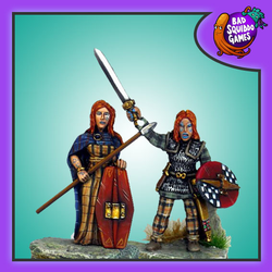 metal miniatures depicting Boudicca, one in a more traditional attire and one in a stylised interpretation of her battle outfit
