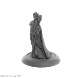 Anthanelle Female Elf Wizard from the Dark Heaven Legends metal range by Reaper Miniatures, wearing a robe and holding an ornate staff in one hand and the other by her side Anthanelle strikes a regal pose 