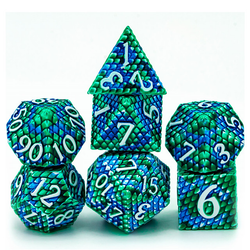 Dragon Scale White Blue Green Metal Dice.hese nice and weighty metal dice have a raised dragon scale pattern all over them in a green and blue colour with flecks of white and white numbers.