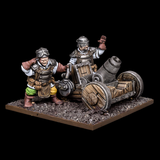 Halfling Howitzer for Kings of War by Mantic Games. two halfling miniatures operate a canon gun looking contraption mounted on a wooden structure with wheels.