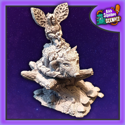 Nature Guardian by Bad Squiddo Games is sculpted by Ristul and can be used in many ways on your gaming table.  A fairy nature spirit riding a boar on top of a tree stump surrounded by vines and foliage. 